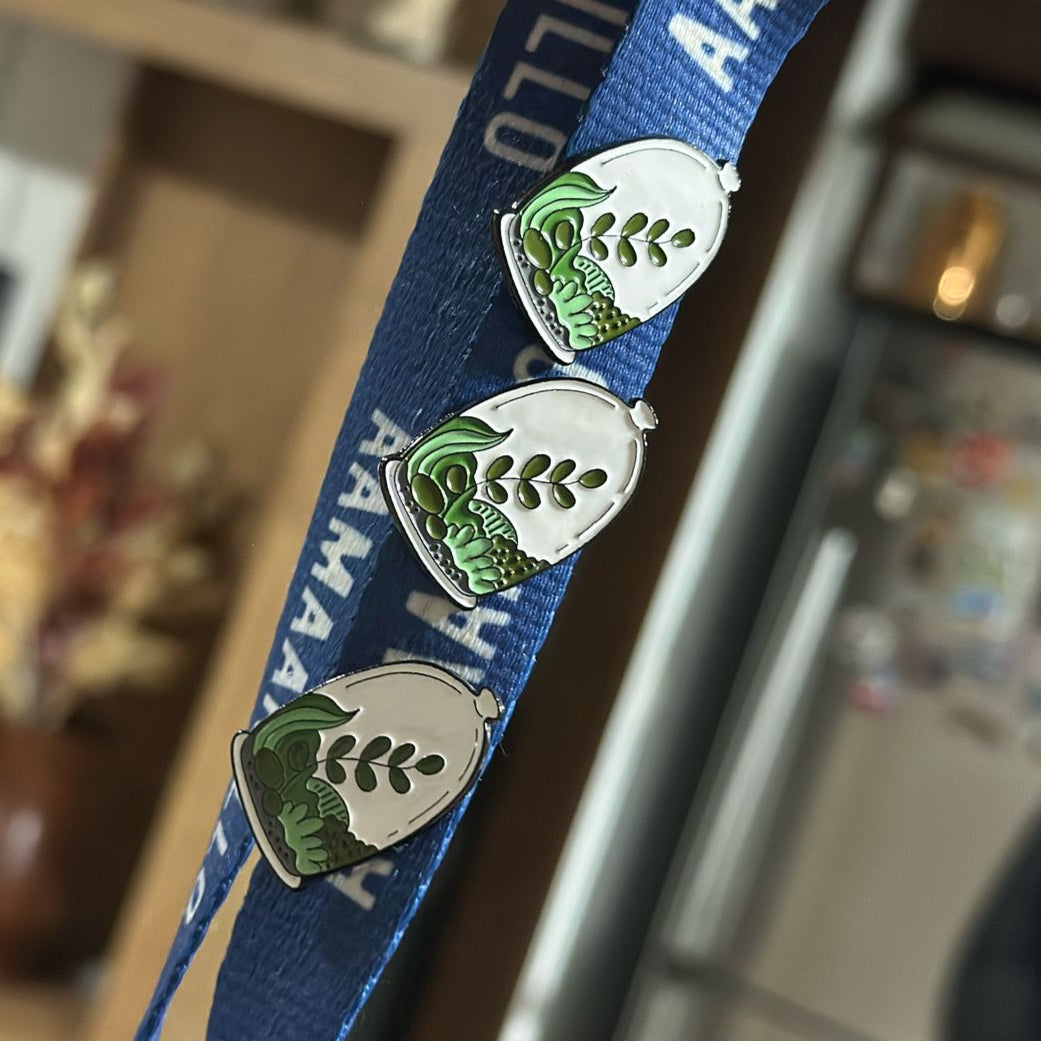 Pin planta en recipiente