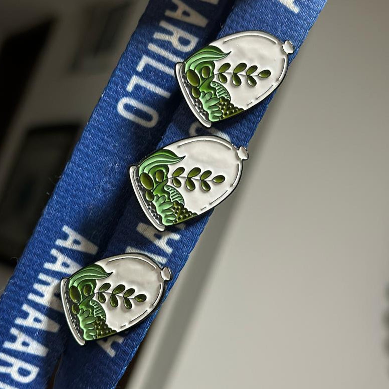 Pin planta en recipiente