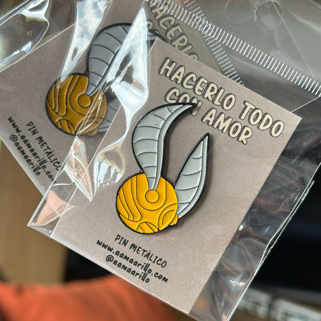 Pin Snitch Dorado