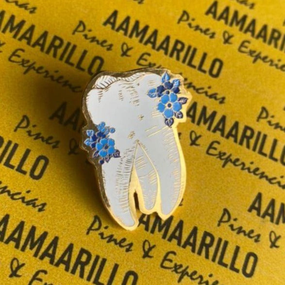 Pin muela florecida