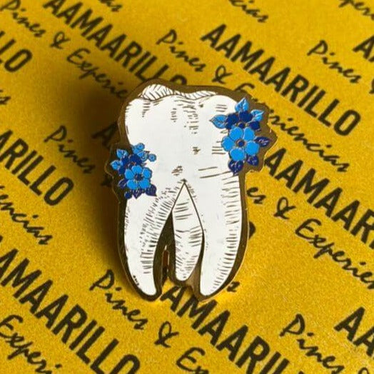 Pin muela florecida