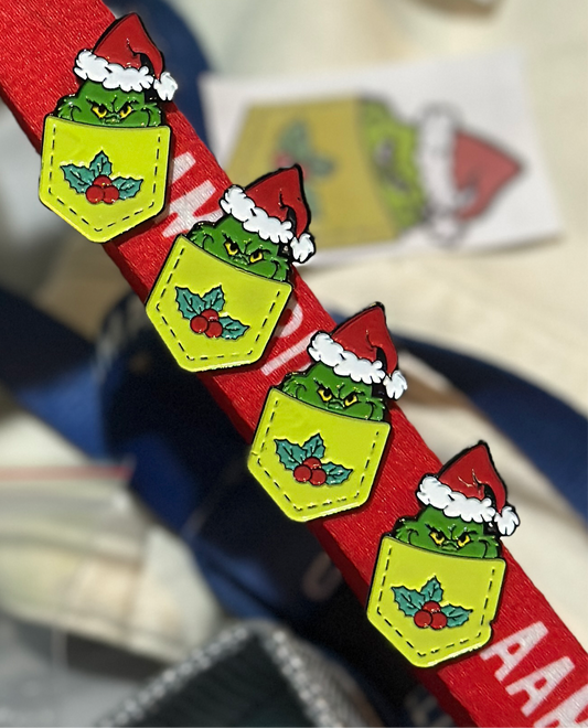 Pin Grinch bota Navidad