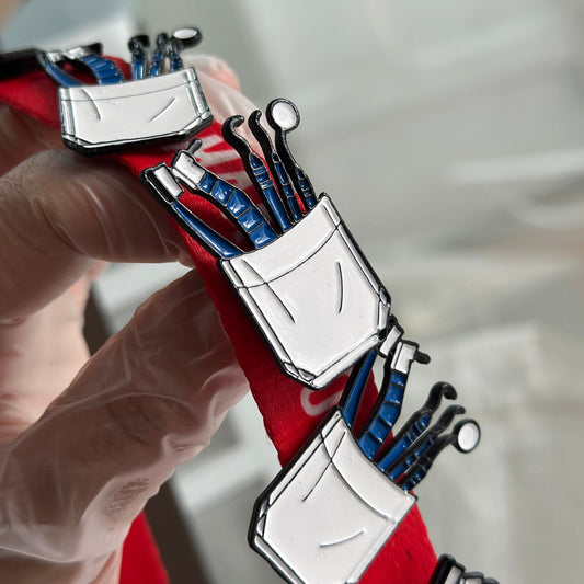 Pin bolsillo de bata herramientas odontología