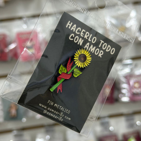 Pin girasol banderín rojo