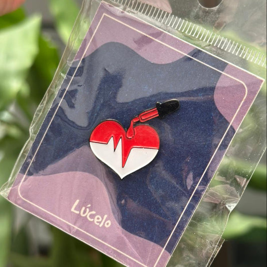 Pin Corazon con gota