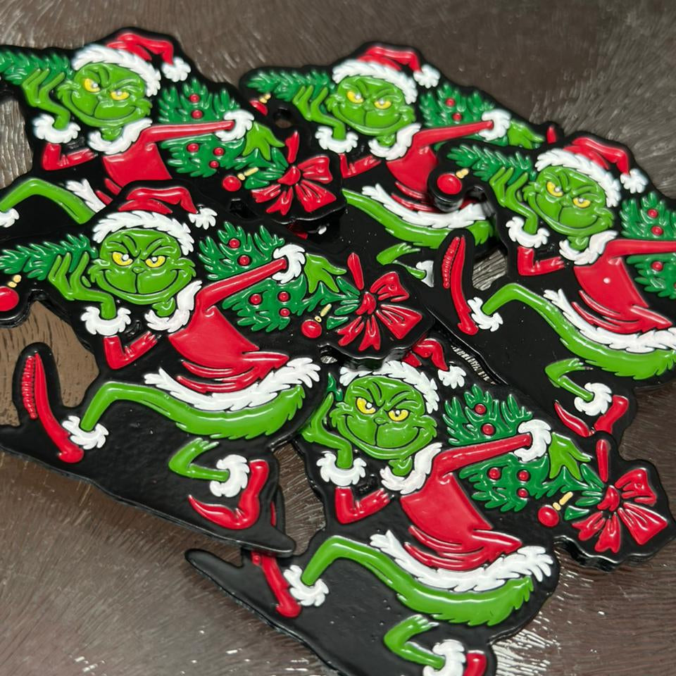 Iman Grinch robando la navidad