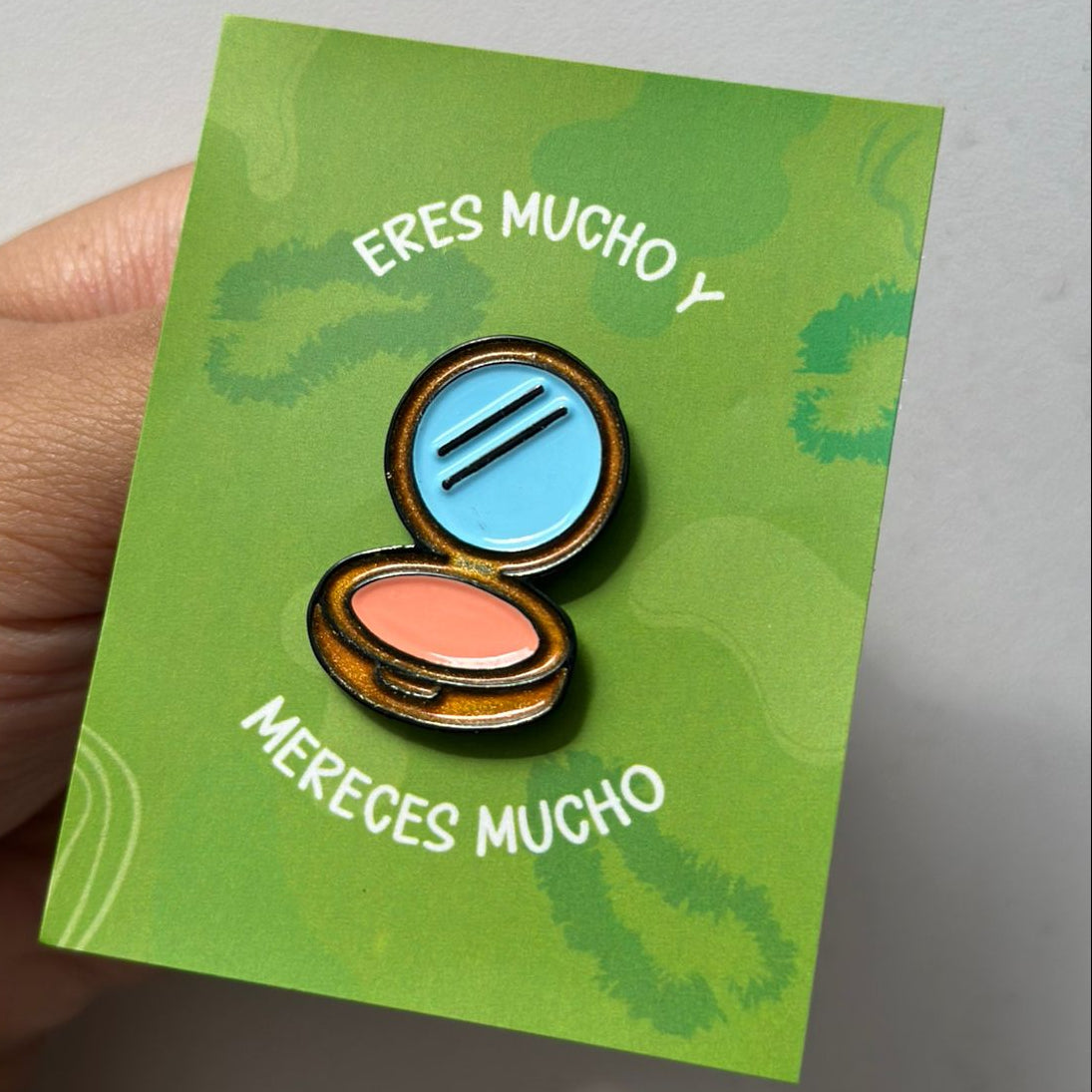 Pin polvo compacto
